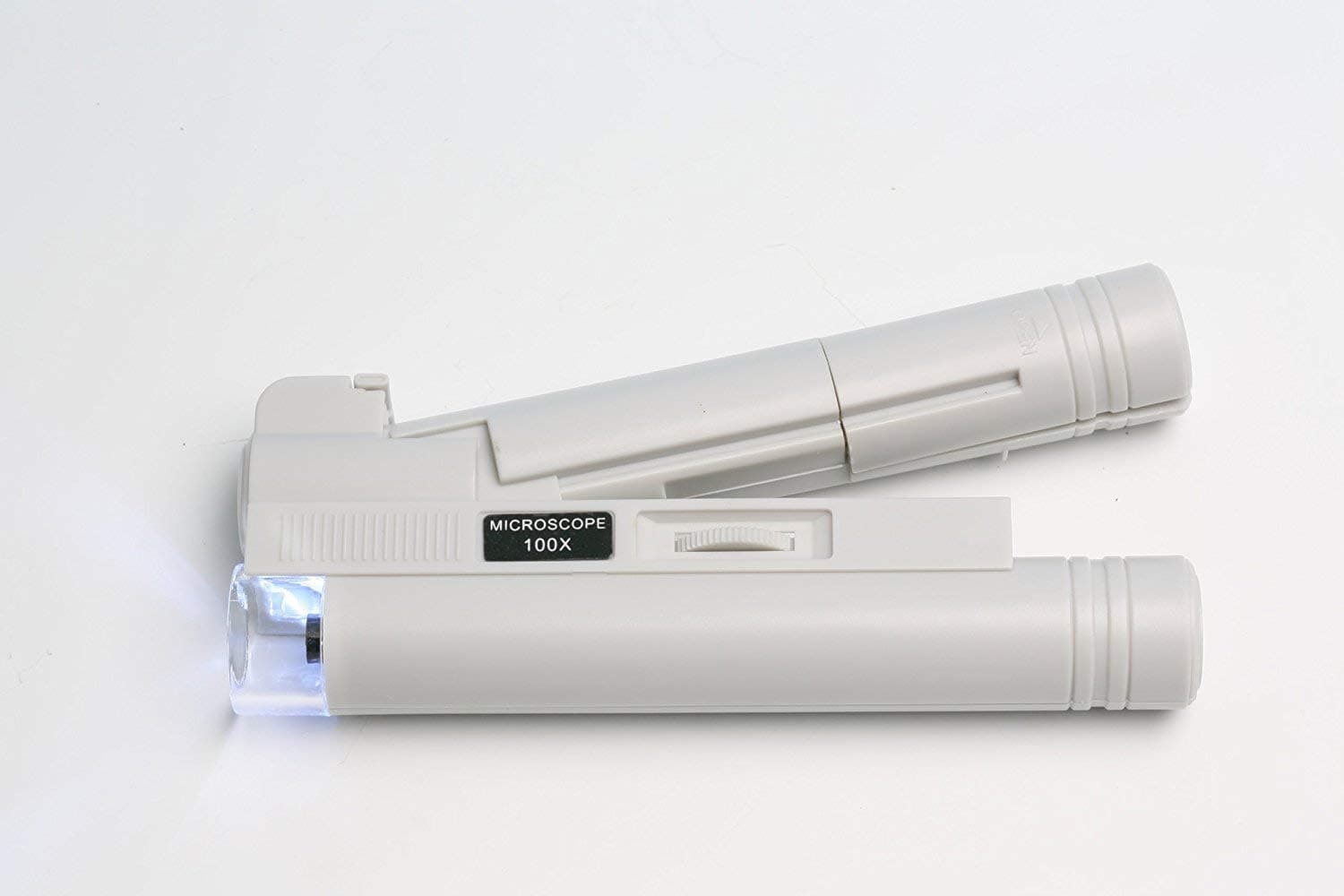 GOLDIFLORA OPTICS MG 10085-1 Pocket Microscope with Reticle Scale in Frame in 0.02 mm Division Approx. x80 Magnification with LED Lamp x2 AA Batteries Included Including x1 Microfibre Cloth x1 Bottle SPEZIAL Lens Cleaner 30 ml x1 Credit Card Size Magnifying Glass Approx. x2.5 Magnification All Free of Charge