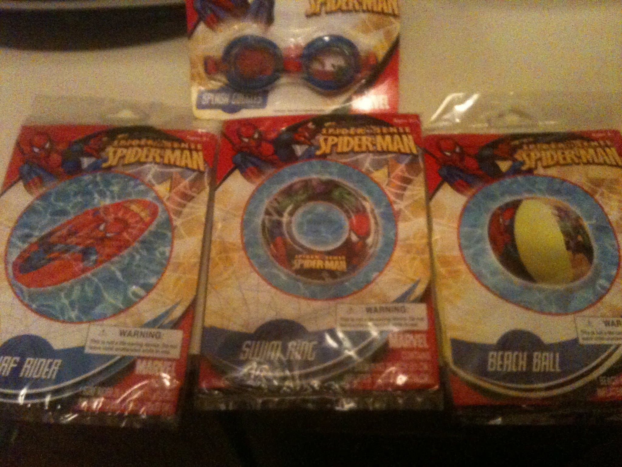 Marvel Superhero Spiderman Pool Set ; Spiderman Surf rider Float, Spidey Spalsh Goggles, Spiderman vs. Green Goblin Swim Ring and Spiderman vs. Green Goblin Beach Ball