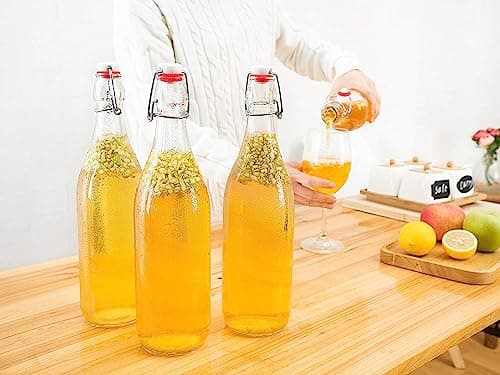 Brezzycloud Rocco Swing Top Bottles 1000ml-4 Pack Round Clear Glass Grolsch Flip Top Bottle With Stopper, for Beverages, Smoothies, Kefir, Beer, Soda, Juicing, Kombucha, Water, Milk and Vinegar