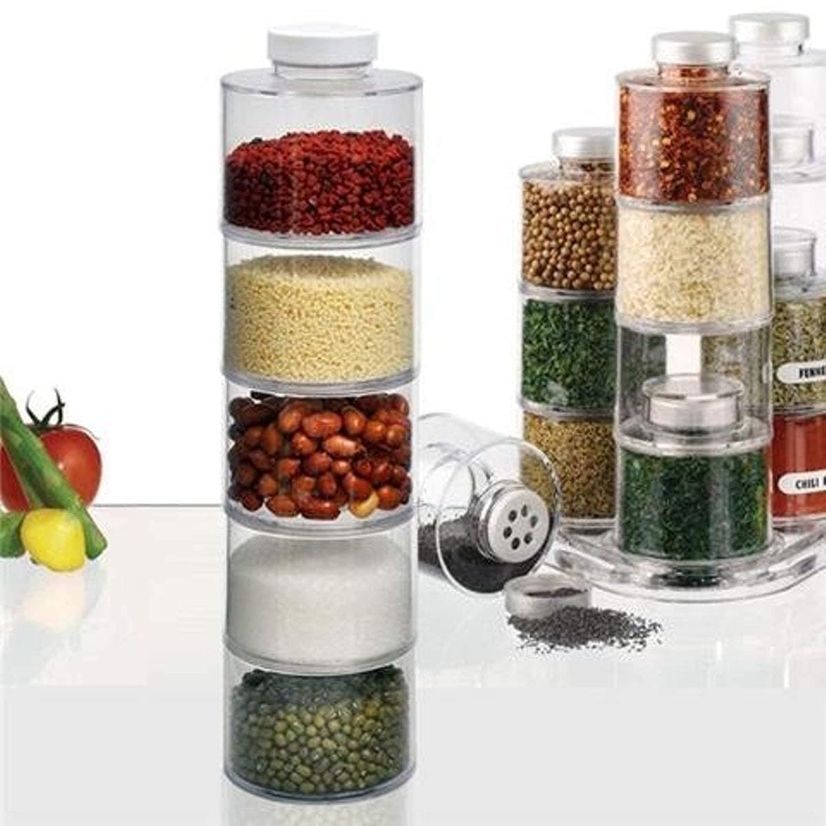 Ritmo 6 self-stacking spice bottles create highly colorful decorative storage space with minimum volume. Great space saving alternative to a spice rack. Spice Tower Carousel
