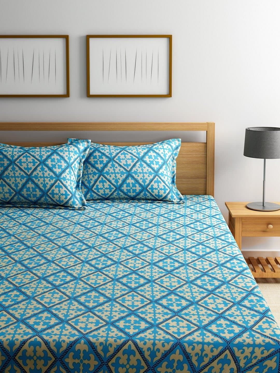 Bombay Dyeing Mistyrose Blue Geometric Patterned Bedsheet With Two Pillow Covers